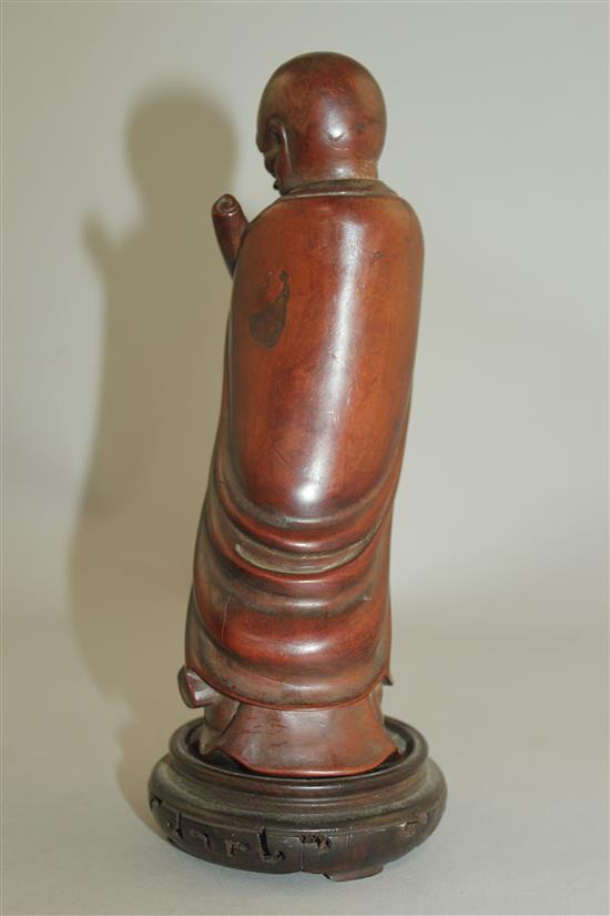 A Chinese hardwood figure of Luohan, 19th century, 18cm